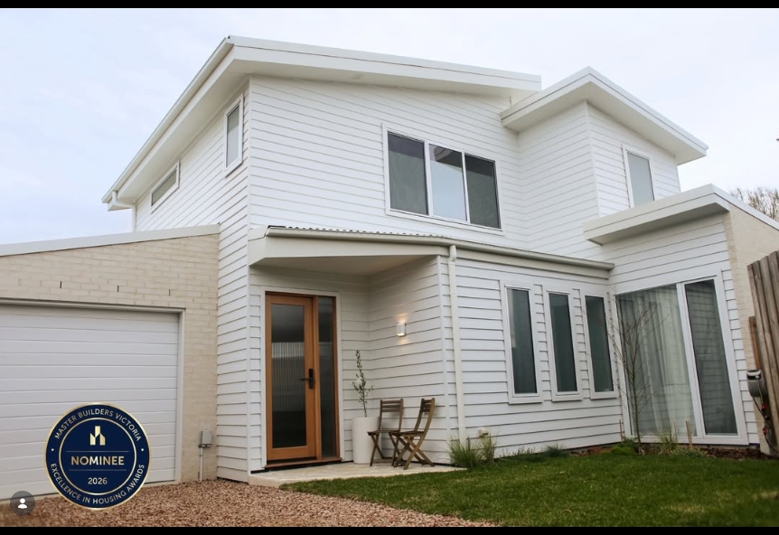 Completed Bonbeach home with a Master Builders Victoria Excellence in Housing Awards 2026 Nominee badge overlaid in the bottom-left corner